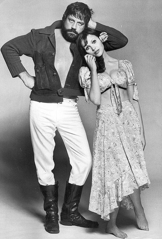 Oliver Reed and Madeline Smith.... 2