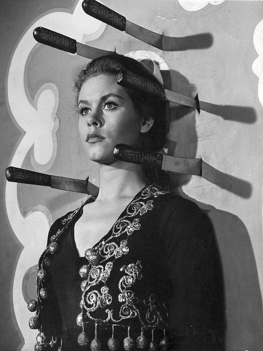 Elizabeth Montgomery as a knife thrower's assistant on the TV show Frontier Circ...