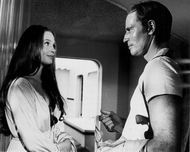 Leigh Taylor-Young and Charlton Heston in Soylent Green (1973)....