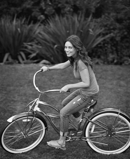 Mila Kunis photographed by Sam Jones....