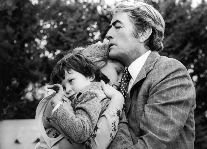 Gregory Peck, Lee Remick and Harvey Spencer Stephens in The Omen (1976)....