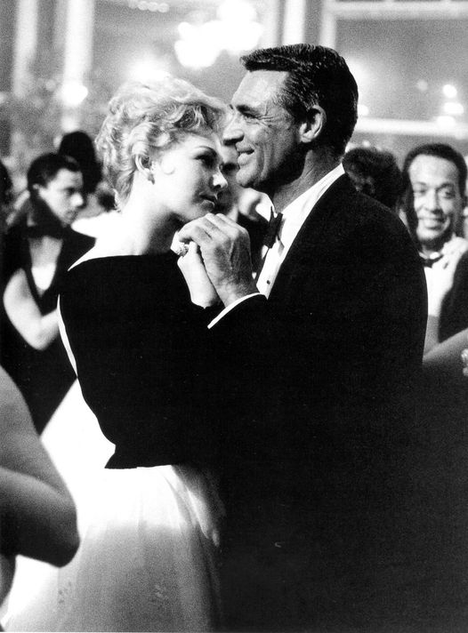 Cary Grant and Kim Novak dancing at the Cannes Film Festival, 1959....