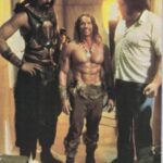 Arnold Schwarzenegger with Wilt Chamberlain and Andrè the Giant on the set of Co...