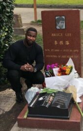 Michael Jai White at Bruce Lee’s grave. It’s pretty crazy to see how many flower...